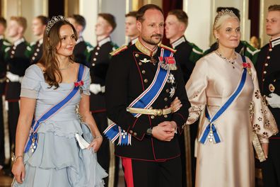 From left, Norway's Princess Ingrid Alexandra, left, Crown Prince Haakon and Crown Princess Mette-Marit on their way to a gala dinner at the Palace in connection with the state visit of the Icelandic presidential couple, in Oslo, Tuesday, April 8, 2025. (Fredrik Varfjell/NTB via AP)