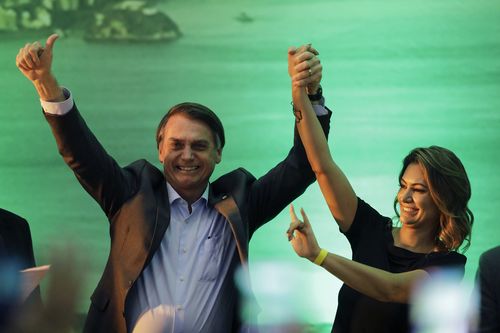 Jair Bolsonaro and wife Michele on the campaign trail.