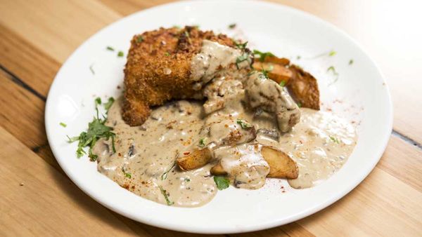 The Shahrouk's crumbed chicken with mushroom sauce