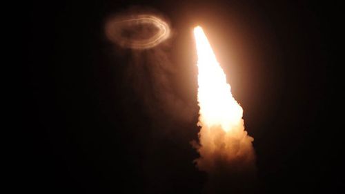 Missile launch creates rare smoke ring and smoke angel