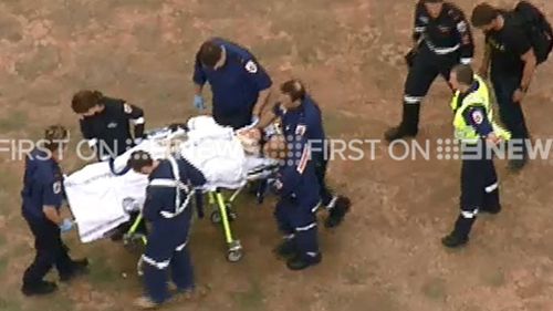 The police officer fell at least 20m. (9NEWS)