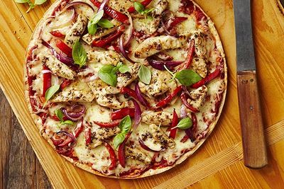Mediterranean chicken pizza with basil