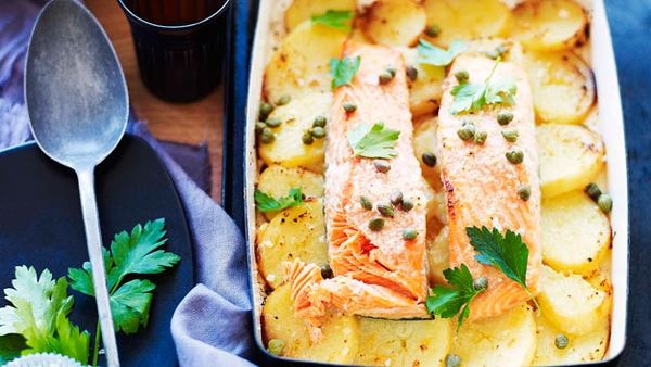 Lemon and garlic roast salmon on potatoes