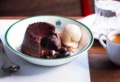 Soft-centred chocolate budini with milk ice-cream