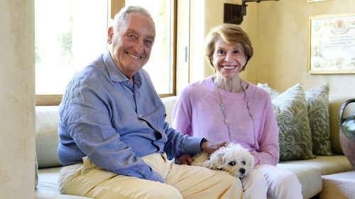 Sandy and Joan Weill pictured with their dog Angel, who received treatment for lymphoma at UC Davis Hospital in 2018.