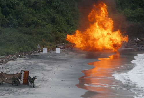 Philippine Marines detonate a target as they train with Australian Defence Forces.