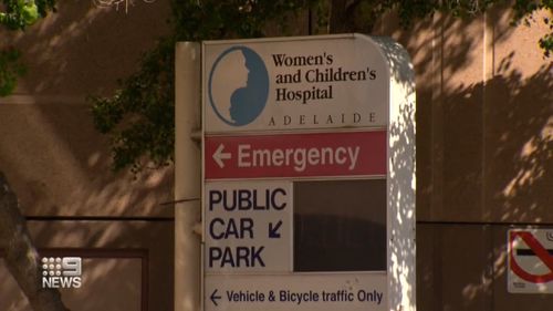 The parents of the seven-year-old girl say she waited eight hours for emergency surgery at the Women's and Children's Hospital in Adelaide.