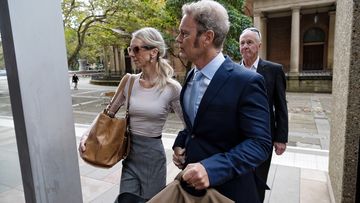 Craig McLachlan and his wife Vanessa Scammell enter Supreme Court on Wednesday May 11.