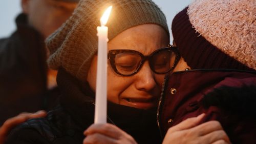 Valerie Reyes' mother, Norma Sanchez, grieves for her daughter during a candlelight vigil in New York last week.