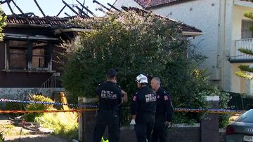 Neighbours said there was nothing they could do, as a fire killed a grandmother in Sydneys inner west.