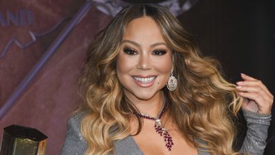 Singer Mariah Carey participates in the ceremonial lighting of the Empire State Building to commemorate the 25th anniversary of the release of her single "All I Want For Christmas Is You" on Tuesday, Dec. 17, 2019, in New York.