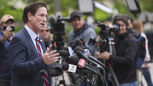 Los Angeles County District Attorney Nathan Hochman speaks outside of court before a hearing in the case of Erik and Lyle Menendez Thursday, April 17, 2025, in Los Angeles. (AP Photo/Damian Dovarganes)