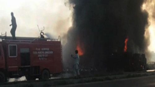 A lorry transporting oil caught fire and burst into flames on a highway in Pakistan. (Radio Pakistan)