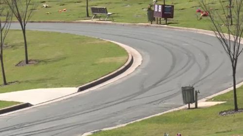 Skid marks on the cemetery path were still visible today. (9NEWS)