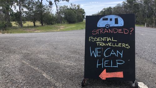 Family trapped in caravan park after travel ban leaves them stranded in Queensland