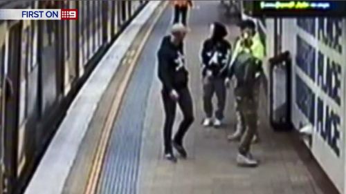 The group of men were spotted on a platform. (9NEWS)