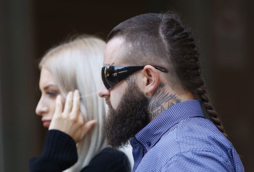 Brittliffe leaves court with a friend. Picture: AAP