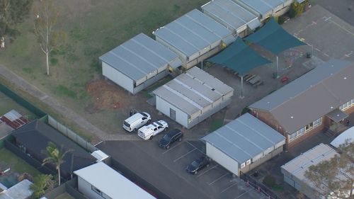 A bullet has gone through a window at Macquarie Fields Public School.