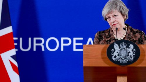UK Prime Minister Theresa May addresses a media conference in Brussels.