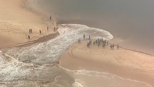 Australia weather news Sydney NSW thunderstorms hail rain winds Dee Why Beach