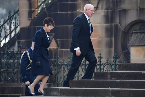 NSW Governor David Hurley and his wife Linda arrive for the State Funeral of Les Murray at St Mary's Cathedral. (AAP)