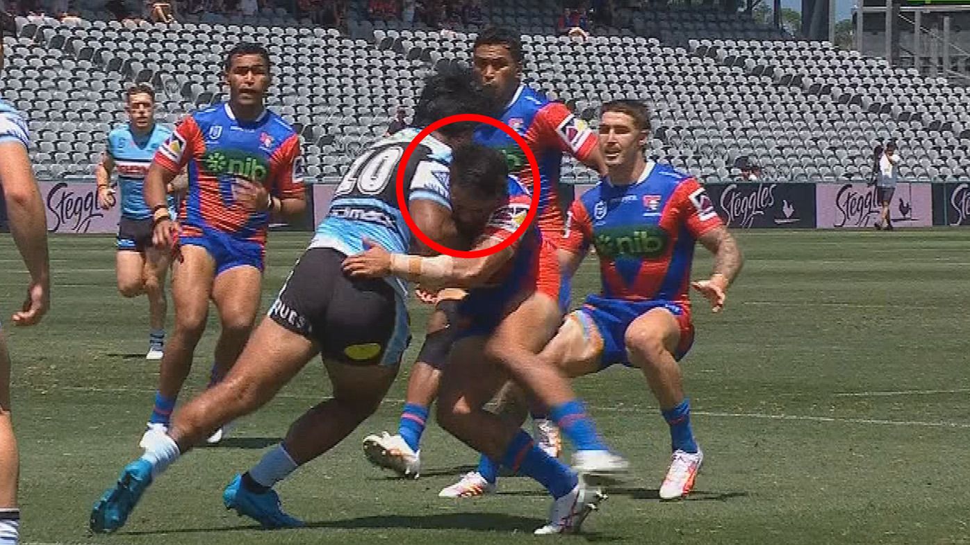 Newcastle&#x27;s Krystian Mapapalangi was knocked out by this blow off the kick off in the trial match against the Sharks.