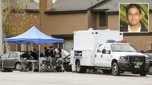 FBI agents outside a home in Redlands, California, linked to the shootings. (AAP)