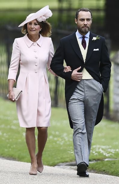 James Middleton (R), brother of the bride, walks with his mother Carole Middleton as they attend the wedding of Pippa Middleton and James Matthews at St Mark's Church in Englefield, west of London, on May 20, 2017. Pippa Middleton hit the headlines with a figure-hugging outfit at her sister Kate's wedding to Prince William but now the world-famous bridesmaid is becoming a bride herself. Once again, all eyes will be on her dress as the 33-year-old marries financier James Matthews on Saturday at a