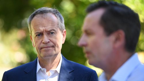 Shorten accuses Liberal party of text scare campaign on WA election day