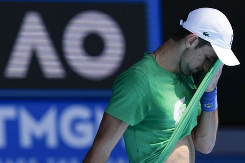 Defending mens champion Serbia's Novak Djokovic practices on Margaret Court Arena ahead of the Australian Open tennis championship in Melbourne, Australia, Thursday, Jan. 13, 2022. 