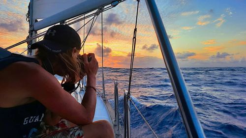 Jake Shepherd takes a moment to soak in some Pacific Ocean beauty, before going below deck to scoop up more water and diesel.