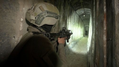 Israeli soldiers show the media an underground tunnel found underneath Shifa Hospital 