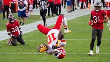 Kansas City Chiefs wide receiver Tyreek Hill  does a back flip into the end zone to score a touchdown against the Tampa Bay Buccaneers during a game in November.