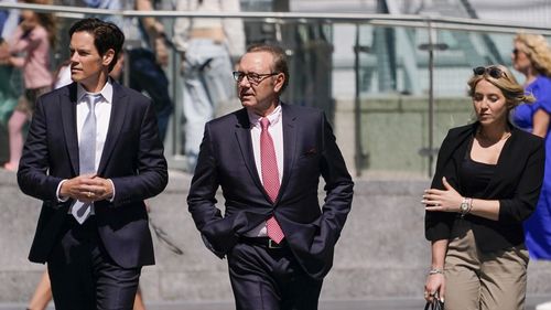 Actor Kevin Spacey, centre, arrives at Southwark Crown Court in London, Wednesday, July 26, 2023. 
