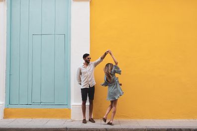 Couple dancing on the street