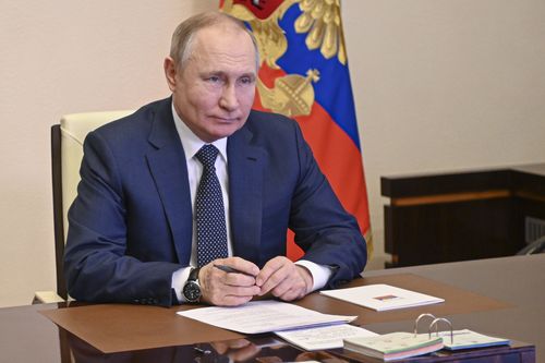 Russian President Vladimir Putin takes part in the launch of a new ferry via a conference call at the Novo-Ogaryovo residence outside Moscow Moscow, Russia, Friday, March 4, 2022. 