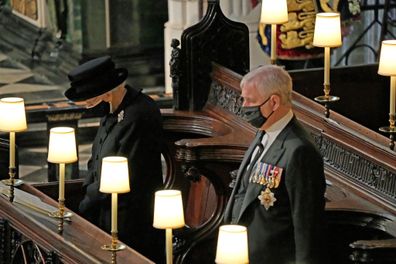 WINDSOR, ENGLAND - APRIL 17: Queen Elizabeth II and Prince Andrew, Duke of York attend the funeral of Prince Philip, Duke of Edinburgh at Windsor Castle on April 17, 2021 in Windsor, England. Prince Philip of Greece and Denmark was born 10 June 1921, in Greece. He served in the British Royal Navy and fought in WWII. He married the then Princess Elizabeth on 20 November 1947 and was created Duke of Edinburgh, Earl of Merioneth, and Baron Greenwich by King VI. He served as Prince Consort to Queen 