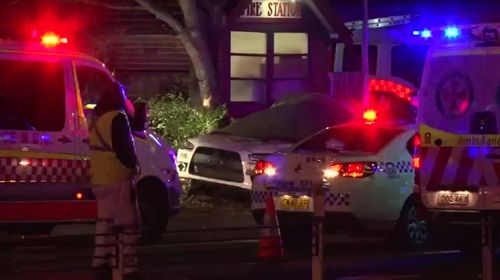 The man's vehicle left Concord Road and hit the tree in front of the Rhodes Fire Station. Picture: 9NEWS.
