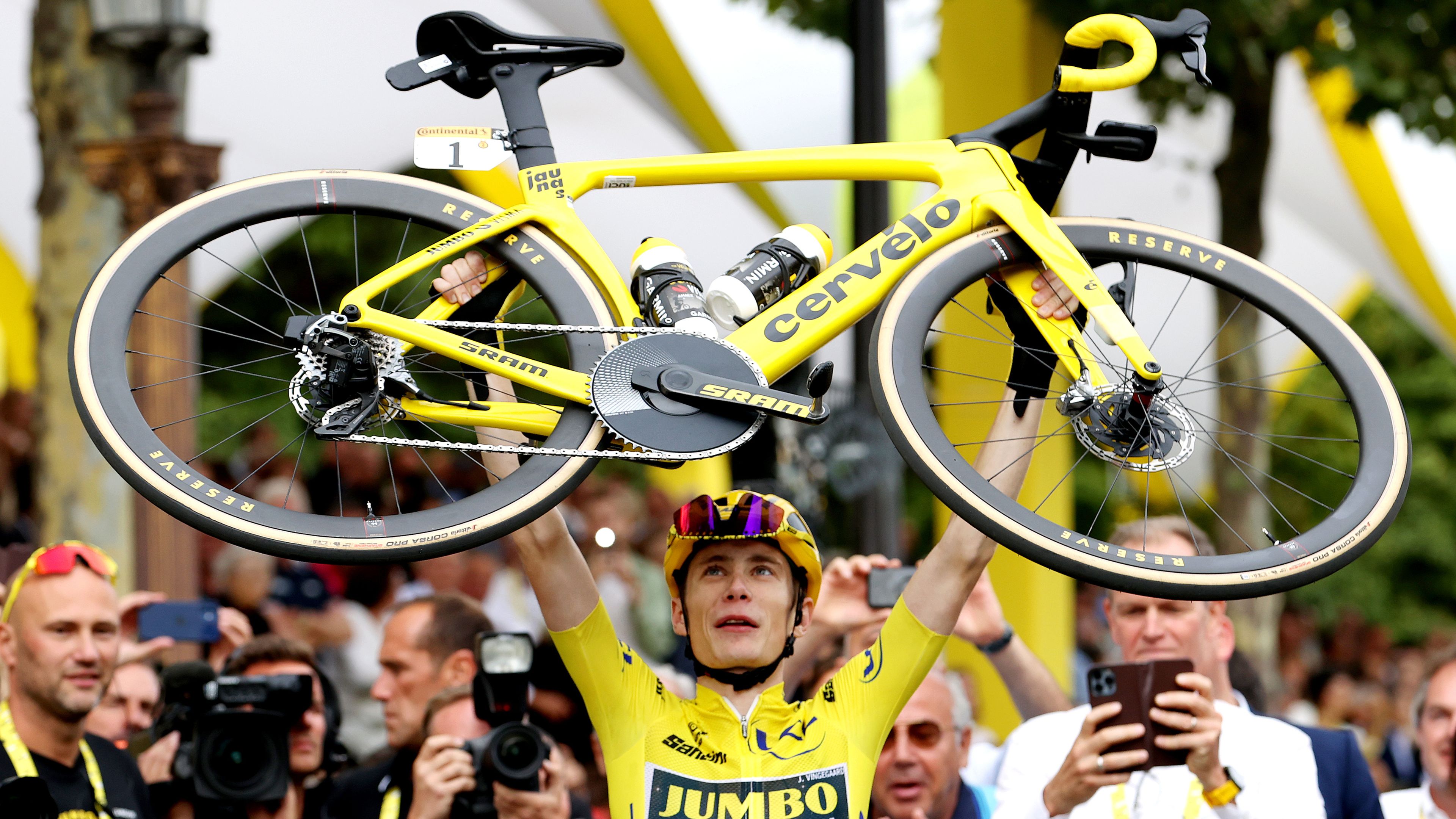 Jonas Vingegaard of Denmark celebrates winning the 2023 Tour de France.