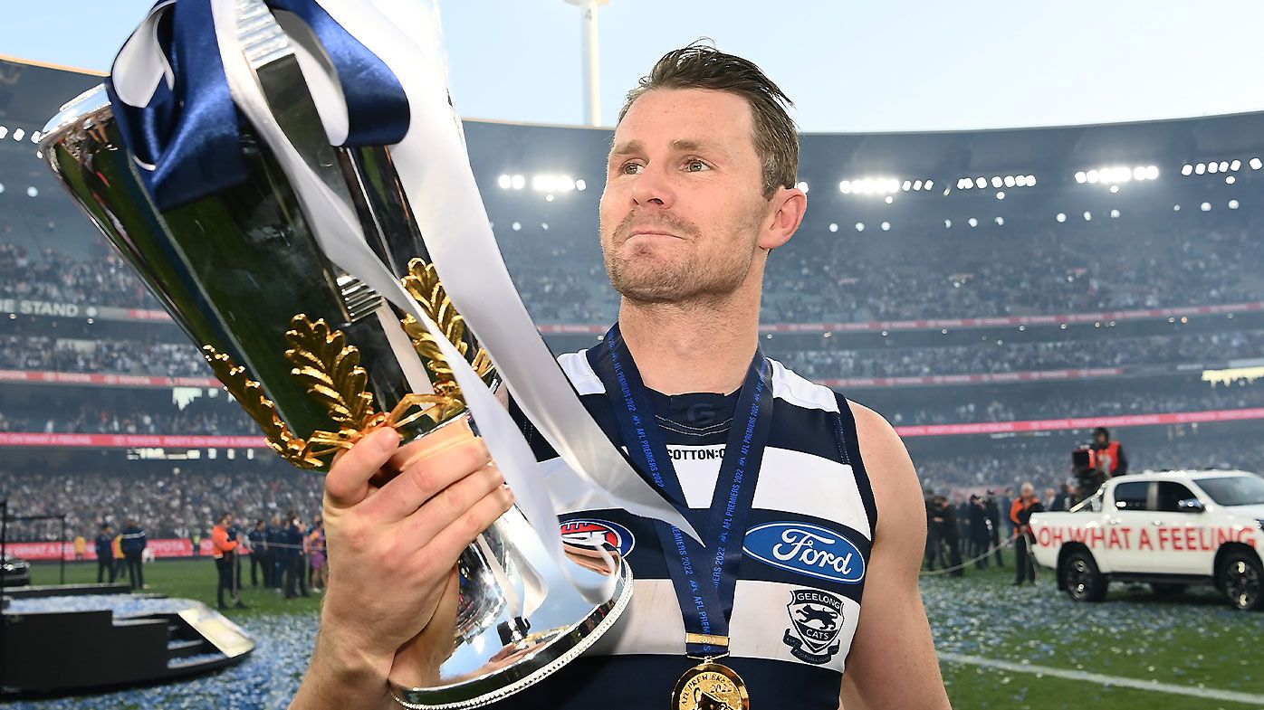 Patrick Dangerfield celebrates with the 2022 premiership cup