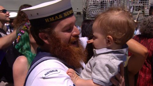 Seeing their young children brought smiles to even the most steely-faced sailors (9NEWS)