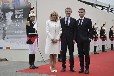 French President Emanuel Macron, right, and his wife Brigitte Macron, welcome Denmark's King Frederik X