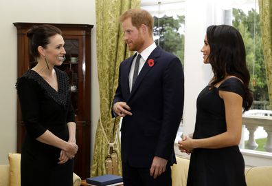Prince Harry and Meghan, Duchess of Sussex meet New Zealand Prime Minister Jacinda Ardern, left, at Government House in Wellington, New Zealand, Sunday, Oct. 28, 2018