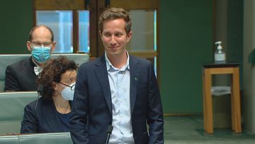 Member for Griffith and the Greens  Max Chandler-Mather without a tie during question time.