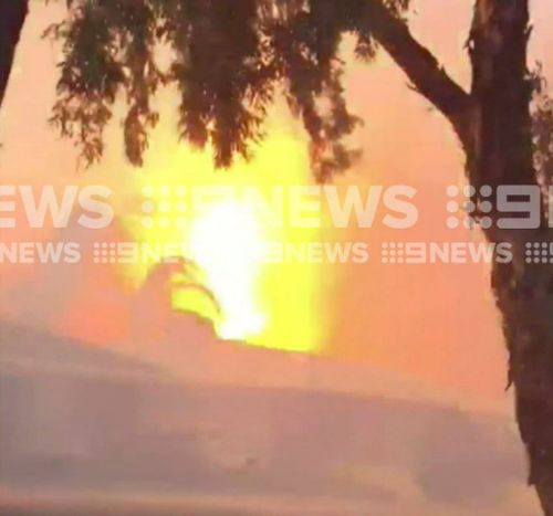 Witnesses filmed the blaze while fleeing. (9NEWS)