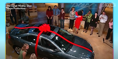 Oprah during her iconic 'You get a car' giveaway in 2004.