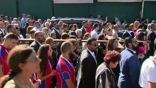 A parade follows the Stations of the Cross in Sydney. (9NEWS)