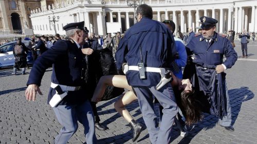 Pope Francis targeted by topless protest at St Peter's Square