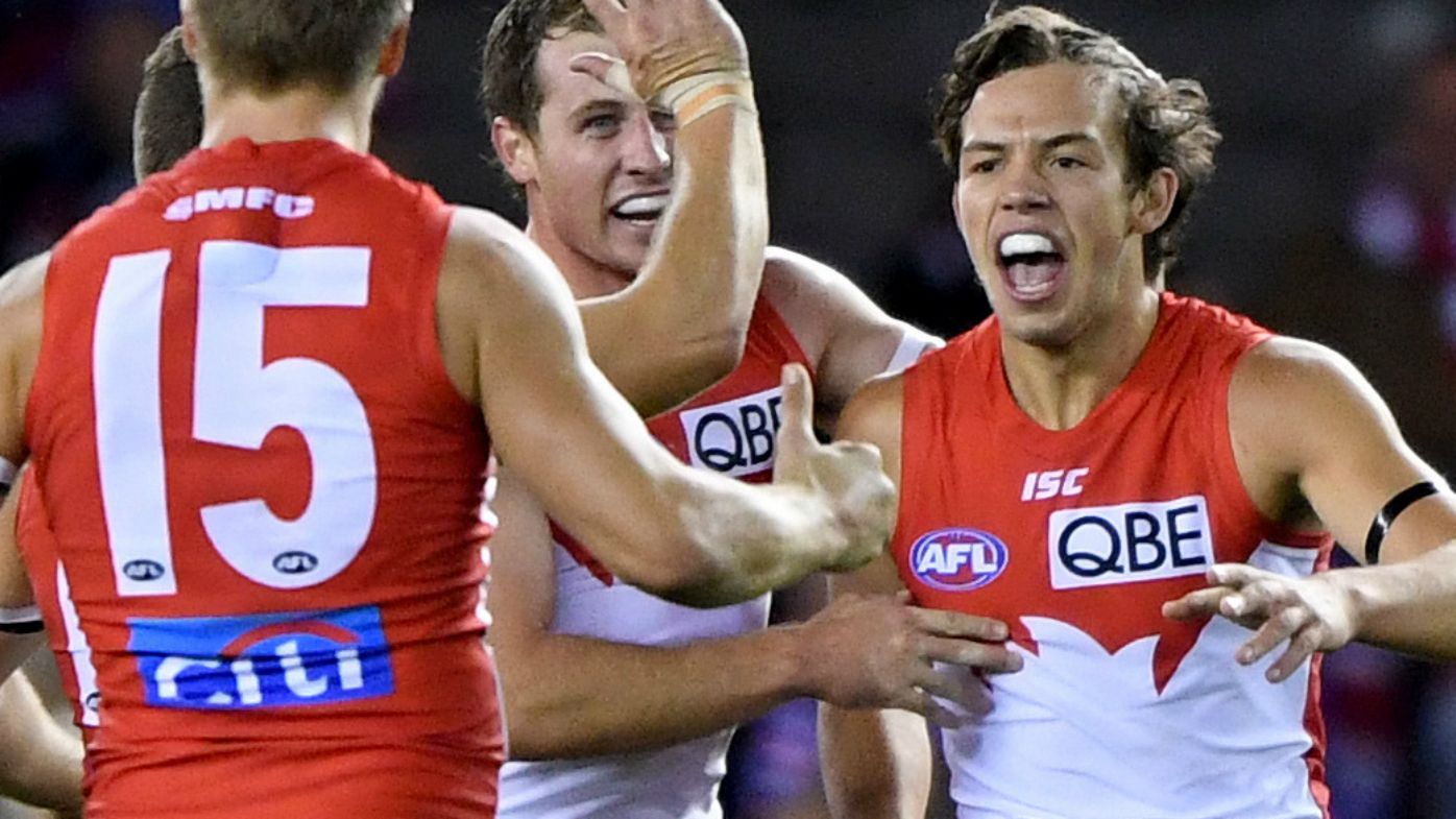 Sydney Swans hold on in a thriller over Western Bulldogs in Etihad Stadium classic