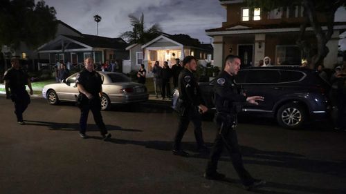 FBI officers at an address connected to Cole Tomas Allen, the shooting suspect at the White House Correspondents Dinner in Torrance, California.